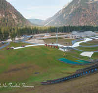 fileadmin/roha/images_galerie/Freizeit-Sport/Biathlon/RUH-BIATH-0020-D-roha-Ruhpolding-Chiemgau-Arena-Biathlon-Schneeband-Loipe-Stadion-Sprungschanze.png