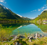 fileadmin/roha/images_galerie/orte_landschaft/Berchtesgaden/Ramsau/BGD-RA-HI-0023-D-roha-Berchtesgaden-Ramsau-Hintersee-Hochkalter-Wasser.png