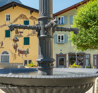 fileadmin/roha/images_galerie/orte_landschaft/Bad_Reichenhall/BAD-REI-FLO-0002-05-D-roha-Bad-Reichenhall-Florianiplatz-Brunnen-heiliger-Florian.png