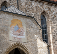 fileadmin/roha/images_galerie/orte_landschaft/Laufen/LAUF-STIFTSK-0008-01-D-roha-Laufen-Stiftskirche-Sonnenuhr-Fassade.png